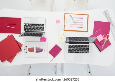 Tablet, notebook personal computer, graph and file on office table