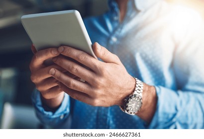 Tablet, office and hands of business man for research project, website review and internet. Creative workplace, closeup and person on digital tech for networking, planning or typing email for contact - Powered by Shutterstock