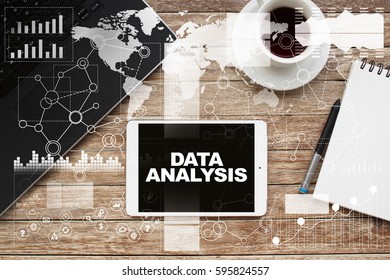 Tablet on desktop with data analysis text.