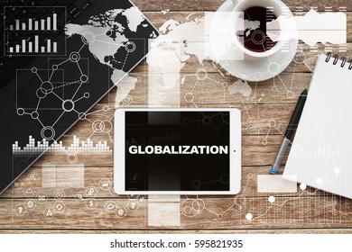 Tablet on desktop with globalization text.