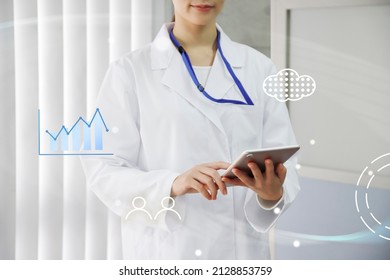 Tablet Operation Input Data And Female Medical Staff