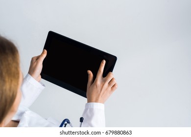 Tablet Pc Device With Blank Screen In Hands Of Doctor