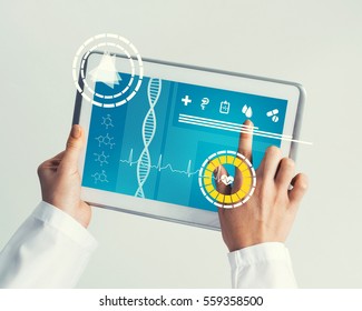 Tablet pc device with medicine interface screen in hands of doctor