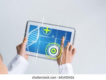 Tablet pc device with medicine interface screen in hands of doctor