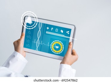 Tablet pc device with medicine interface screen in hands of doctor