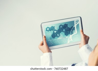 Tablet pc device with medicine interface screen in hands of doctor