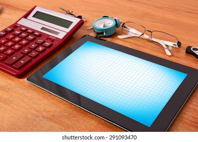 Tablet pc with empty screen on table