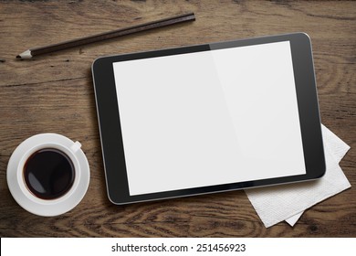 Tablet Pc Like Ipad On Table Desk With Coffee Cup And Pencil