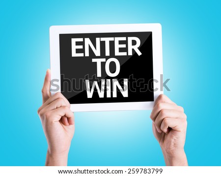 Tablet pc with text Enter to Win with blue background