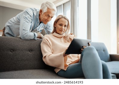 Tablet, plan and couch with couple and digital banking with budget and financial decision. Discussion, marriage and tech of mature people together in living room with home and retirement talk - Powered by Shutterstock