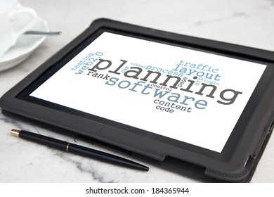 tablet with planning software word cloud