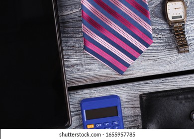 Tablet and pocket calculator. Men's accessory. - Powered by Shutterstock