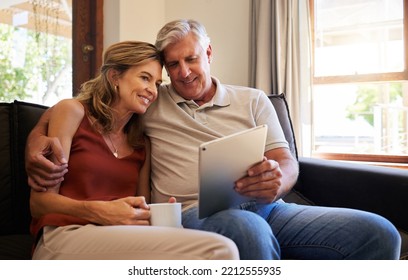 Tablet, Relax And Old Couple Streaming A Movie Via Online Subscription Or Enjoying Internet Video Content On Sofa. Smile, Love And Married Woman Watching Tv With A Romantic Elderly Partner At Home