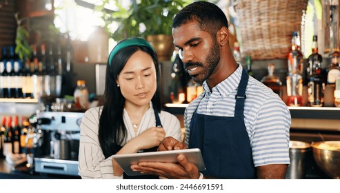 Tablet, restaurant bartender and team discussion on alcohol stock, store trade or bar inventory in startup business. Planning, hospitality service and entrepreneur cooperation on drinks supply chain - Powered by Shutterstock