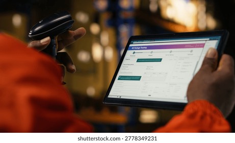 Tablet and scanner, verifying and organizing packages, african american staff in warehouse, production workflow highlights safety compliance. AWB cargo tracking in distribution center.