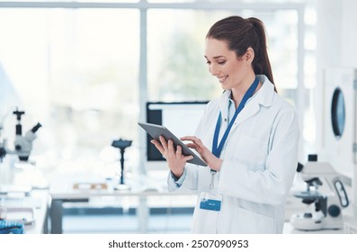 Tablet, scientist and confidence in science laboratory for medical research, biology and pharmaceutical. Female person, technology and technician in pathology, testing and investigation for vaccine - Powered by Shutterstock