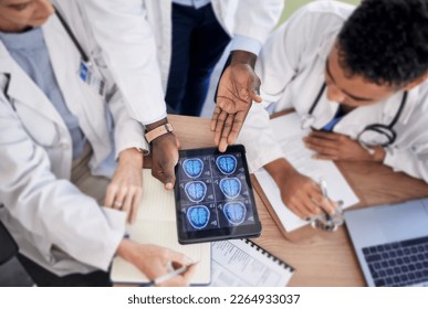 Tablet screen, brain and doctors in neurology research, internship training and teamwork for healthcare solution. Assessment, cancer analysis and xray of medical students or professional people above