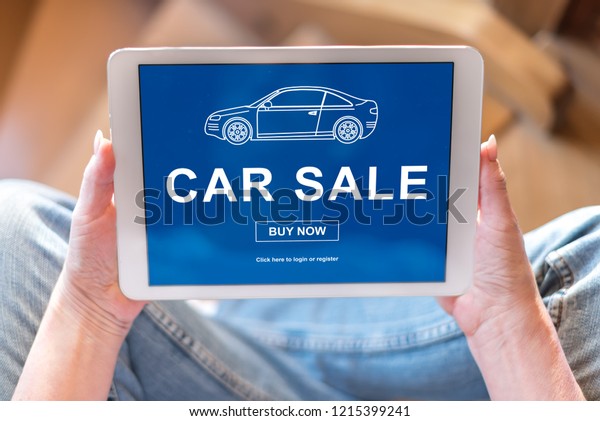 Tablet screen\
displaying a car sale\
concept