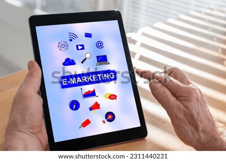 Tablet screen displaying an e-marketing concept