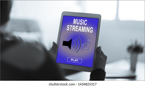 Tablet screen displaying a music streaming concept
