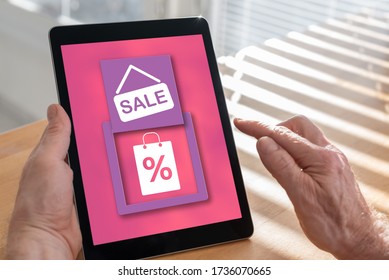 Tablet screen displaying a sale concept