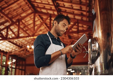 Tablet, search and brewery with man in factory for production, manufacturing and alcohol fermentation. Technology, inspection and digital with business owner for distillery, beer and quality control - Powered by Shutterstock