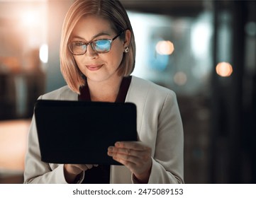 Tablet, search and business woman with glasses in night office online for planning, research or b2b client communication. Digital, feedback and manager reading social media survey or startup review - Powered by Shutterstock