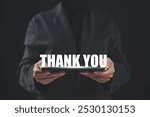 tablet shows the message thank you on a display screen. concept of thank you business, congratulations, and appreciation gratitude. presentation from technology digital