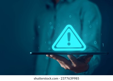 tablet shows a warning sign of system failure. concept notification a spam, risk of website technology digital online. caution danger if a computer is attacked cyber error symbol, leak software data