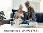 Tablet, sofa and woman relax with senior mother in home for help with online blog, internet or connectivity. Bonding, smile and elderly person learning digital technology with daughter at house