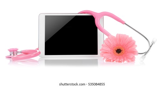Tablet with stethoscope and flower on white background