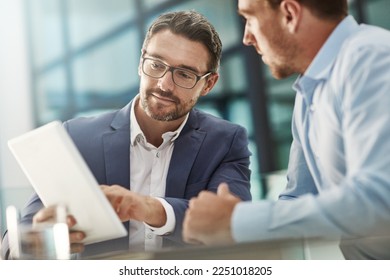 Tablet, teamwork and meeting of business people in office discussion. Collaboration, technology and men or employees with touchscreen planning sales, marketing or advertising strategy in company. - Powered by Shutterstock