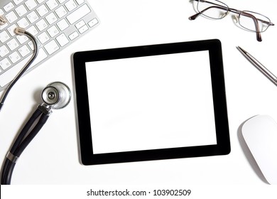 Tablet Touch Pad Computer Gadget On The Table In The Doctor Office