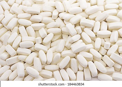 Tablets - texture of capsules with white background