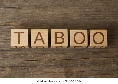 TABOO Text On A Wooden Background