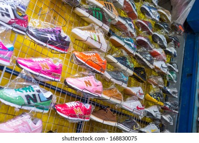 TACHILEIK - AUGUST 3, 2013 : Counterfeit Goods Of Branded Shoes In Black Market In Tachileik, Burma.