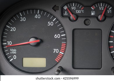 Tachometer, engine water temperature indicator, fuel tank indicator. Volkswagen Golf car.
