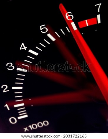 Tachometer - an instrument which measures the working speed of an engine, typically in revolutions per minute.