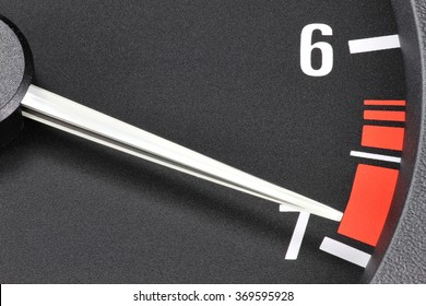 tachometer in red sphere