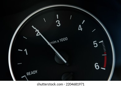 Tachometer Or Revolution Counter, RPM Gauge With Needle On Car Dashboard.