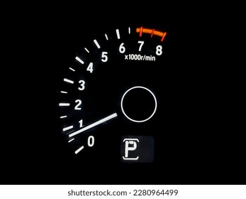 Tachometer rpm gauge rev in conventional modern car. Car instrument panel, interior dashboard control.
