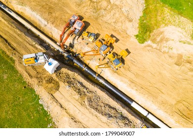 Tachov / Czech Republic - August 18, 2020: Construction site of Antelope gas pipeline. One part of Nord Stream 2 pipeline from Russia to European Union. Workers and cranes making new way for gas.