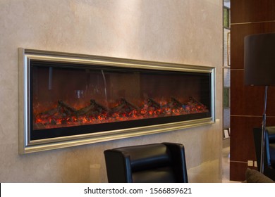 Tacky Fake Fire Place With A Picture Frame