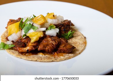 Taco Al Pastor, Mexican Food Isolated On A White Plate