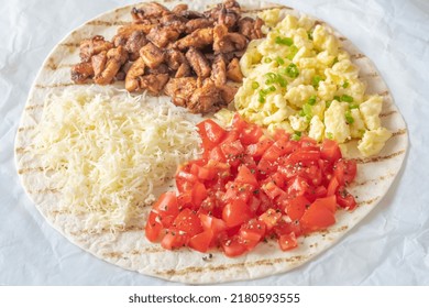 Taco With Chipotle Chicken, Tomato, Cheese And Eggs