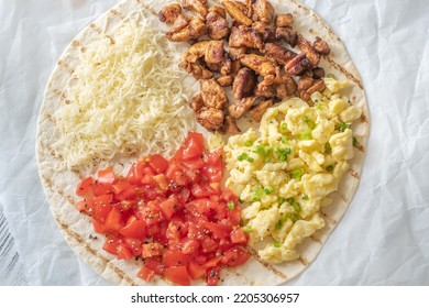 Taco With Chipotle Chicken, Tomato, Cheese And Eggs