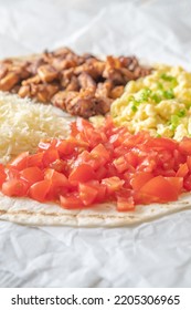 Taco With Chipotle Chicken, Tomato, Cheese And Eggs