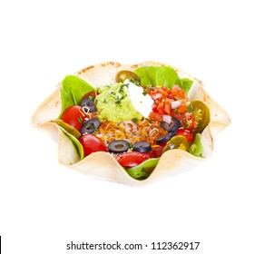 Taco Salad In A Baked Tortilla On White Background