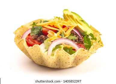 Taco Salad In A Crunch Corn Tortilla Bowl Isolated On A White Background