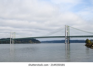 Tacoma Narrows Bridge spanning the water over the Narrows and connecting Tacoma with Gig Harbor in Pierce County